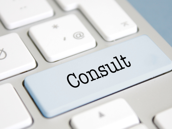 Key on keyboard saying 'Consult'