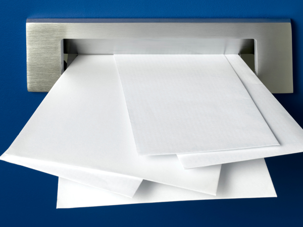 Envelopes coming through letterbox