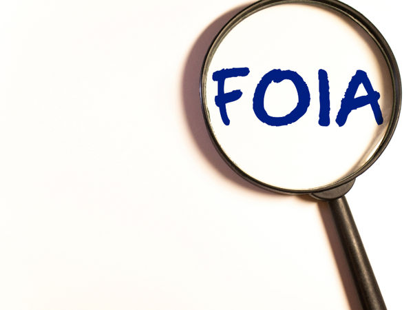 Magnifying glass over word 'FOIA'