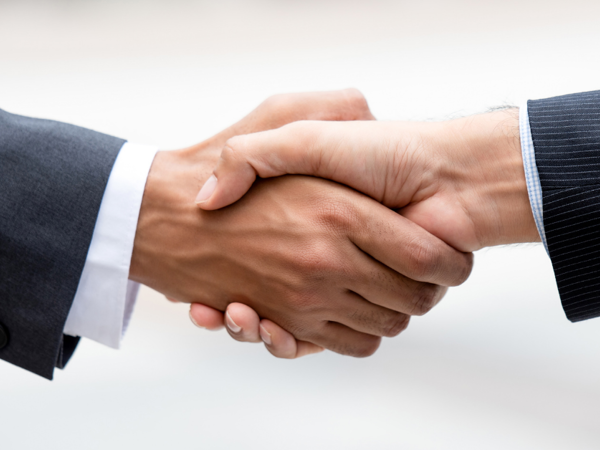Two people shaking hands