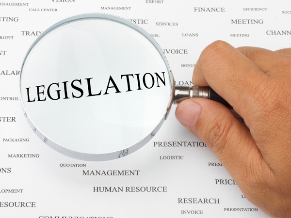 Magnifying glass over word 'Legislation'